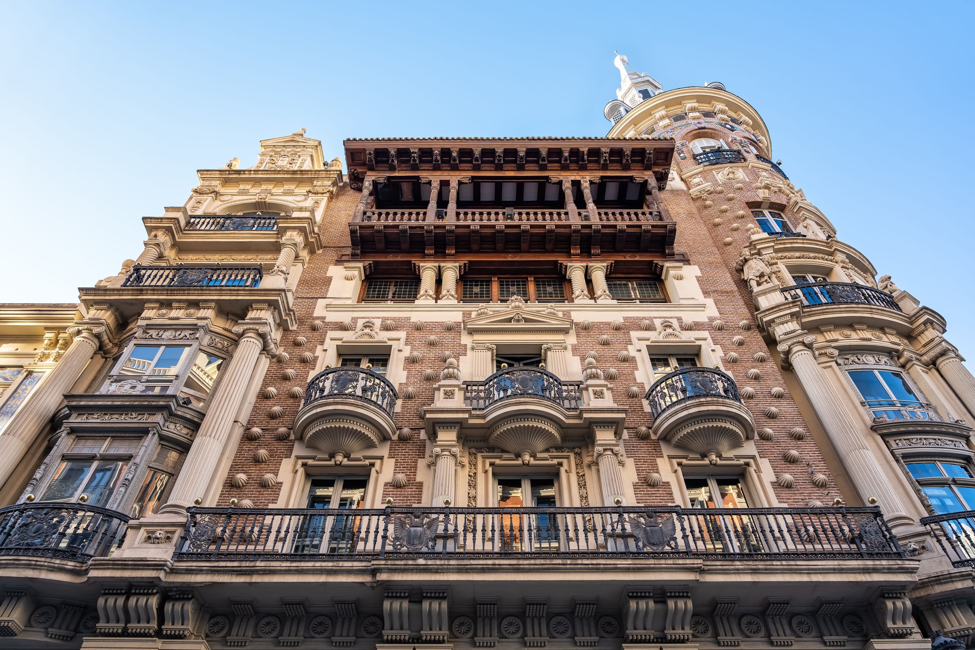 Facade of a picturesque building in the downtown area of the monumental city of Madrid, Spain.